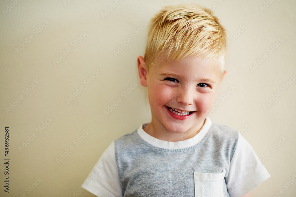 Tell me again how cute you think I am. Portrait of an adorable little boy at home.