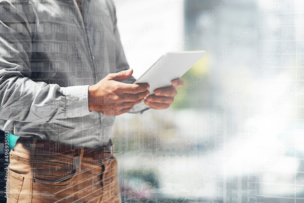 The age of BYOD is here. Multiple exposure shot of an unrecognizable businessman using his digital t