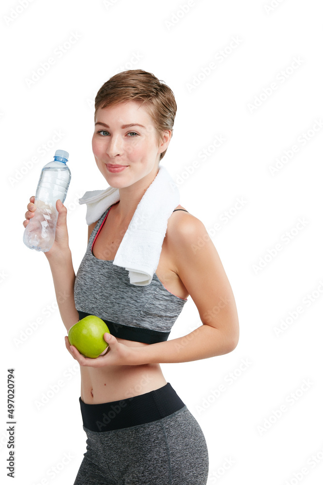 Making health a priority. Studio portrait of a fit young woman posing against a white background.