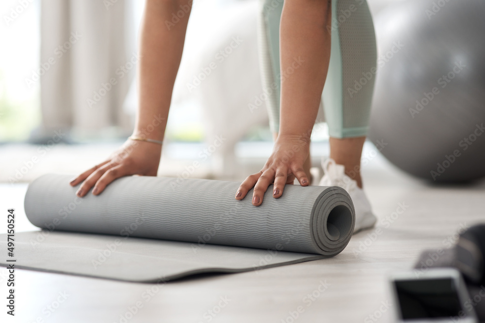 Make a start and youll see the change. Closeup shot of an unrecognisable woman rolling an exercise m