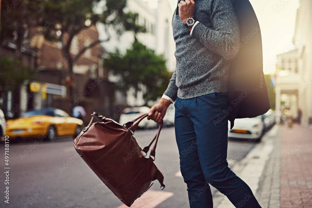 Hes fashionably on his way. Cropped shot of a fashionable young man out in the city.