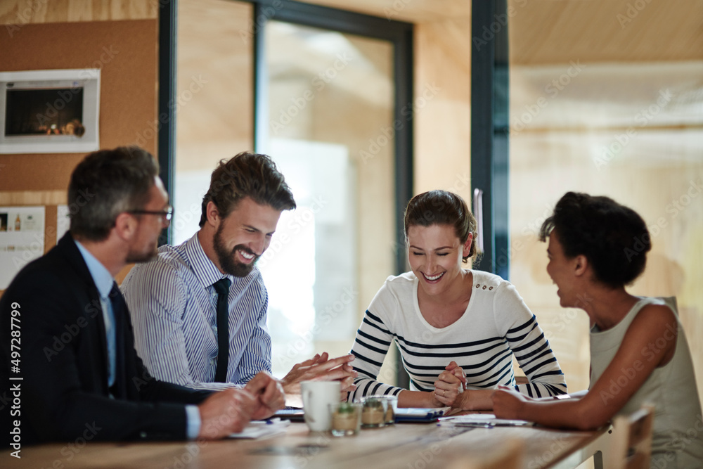 Long meetings dont have to be boring.... Shot of a group of colleagues working together in an office