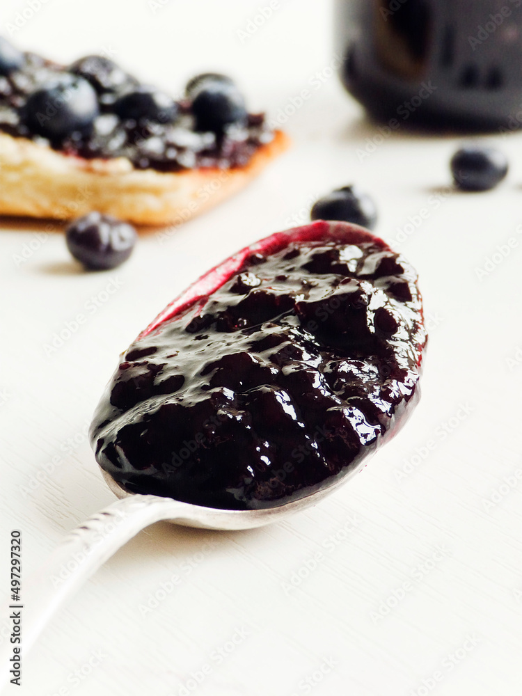 Spoon with blueberry jam