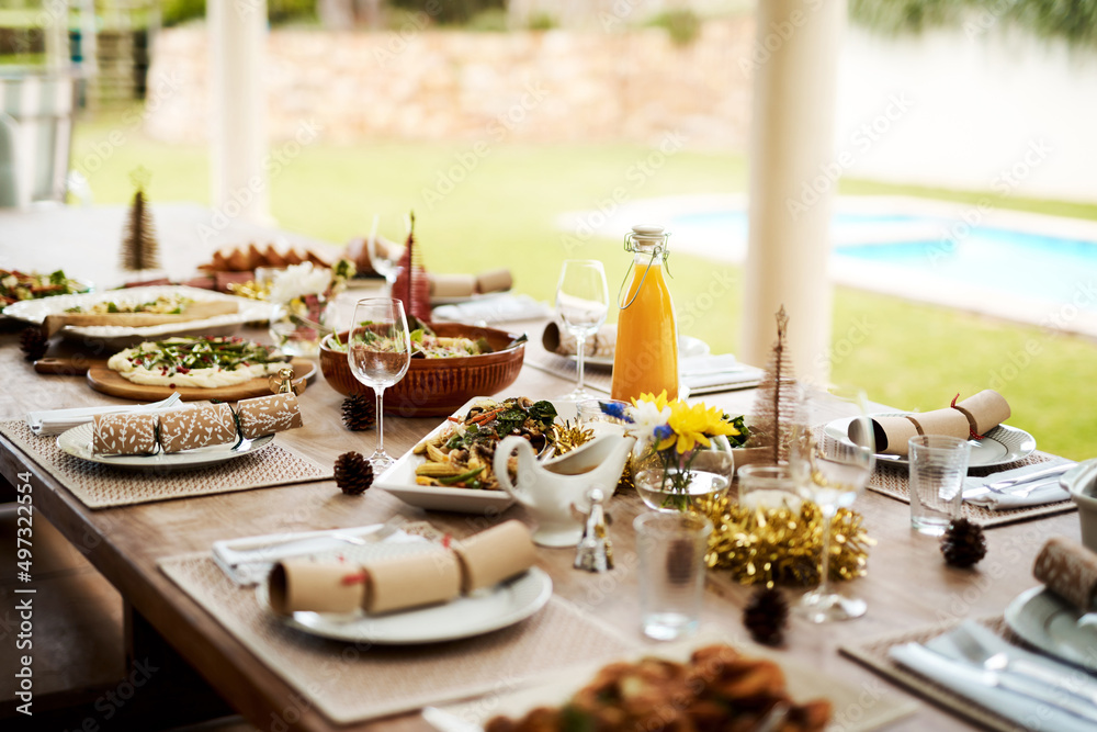 Take a seat and be merry. Cropped shot of a dinning area set up for Christmas day.