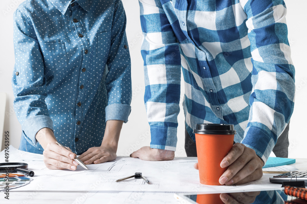 Man and woman together working at design project