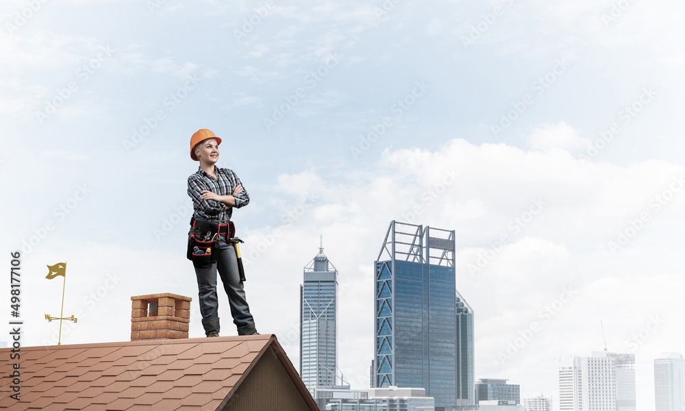 Attractive female worker in hardhat