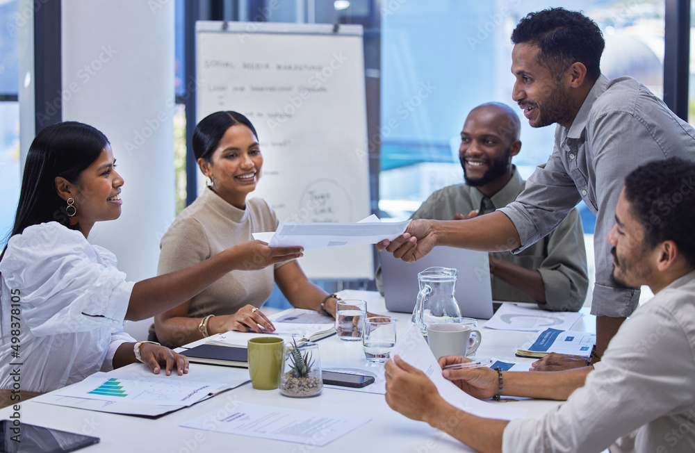 Here are the reports you requested. Shot of a group of businesspeople having a meeting in a boardroo