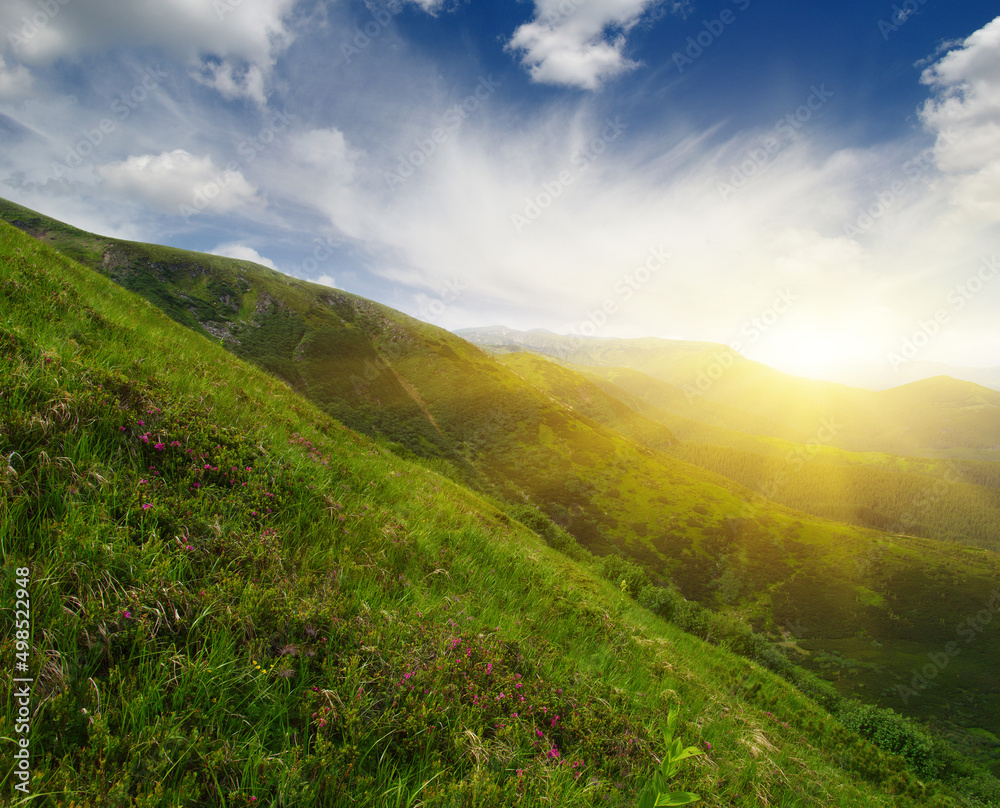 Mountain landscape on sun