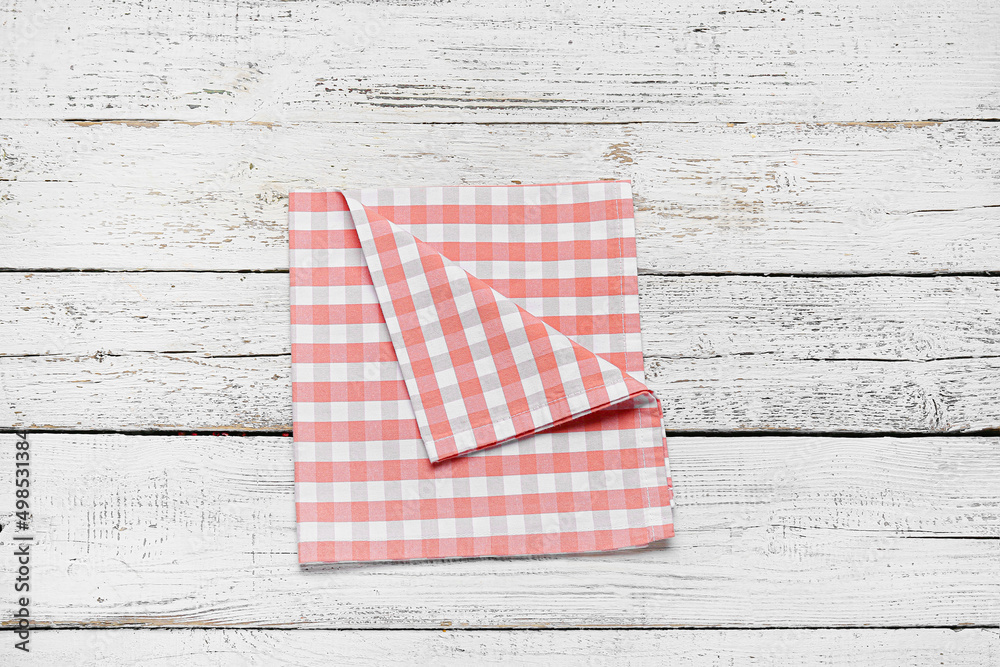 Clean napkin on white wooden background