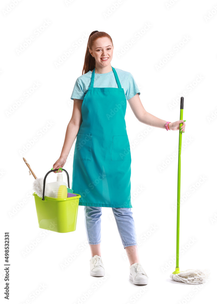 Young woman with cleaning supplies on white background