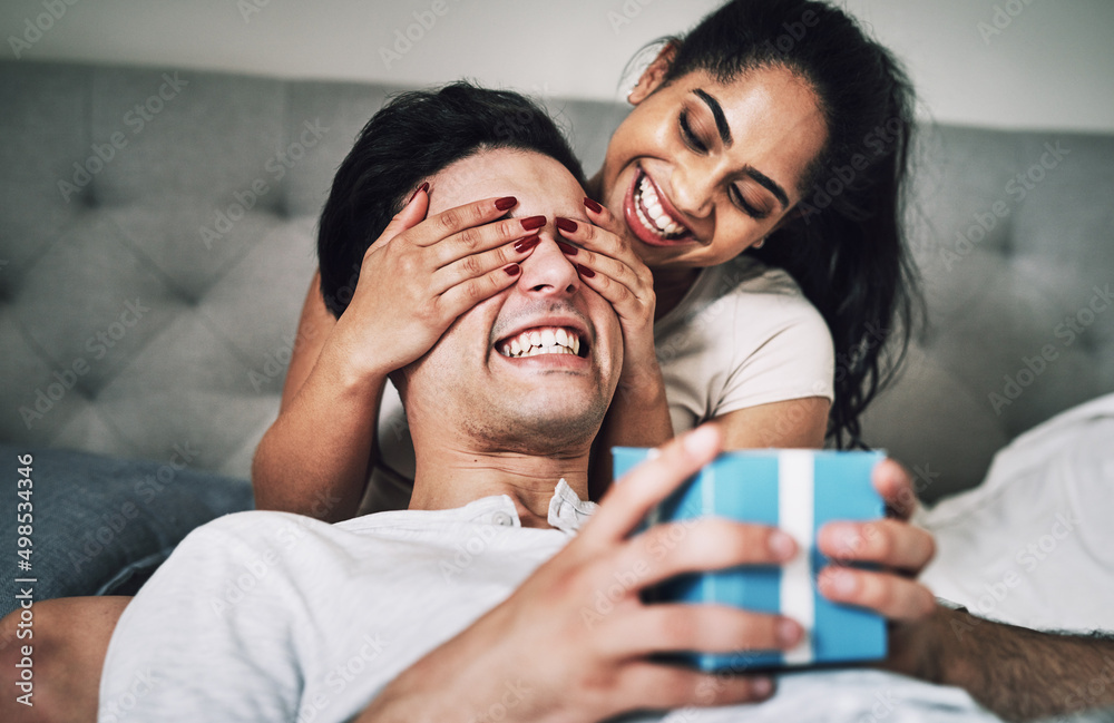 Are you ready to see what I got you. Shot of a woman covering her boyfriends eyes while surprising h