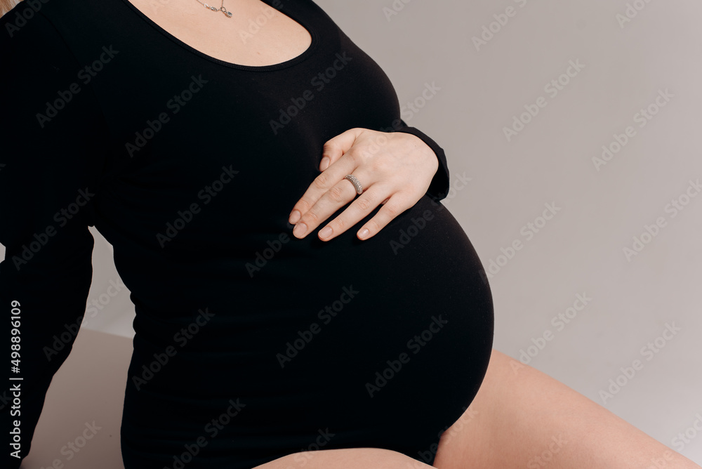 Pregnancy, girl in black pregnant