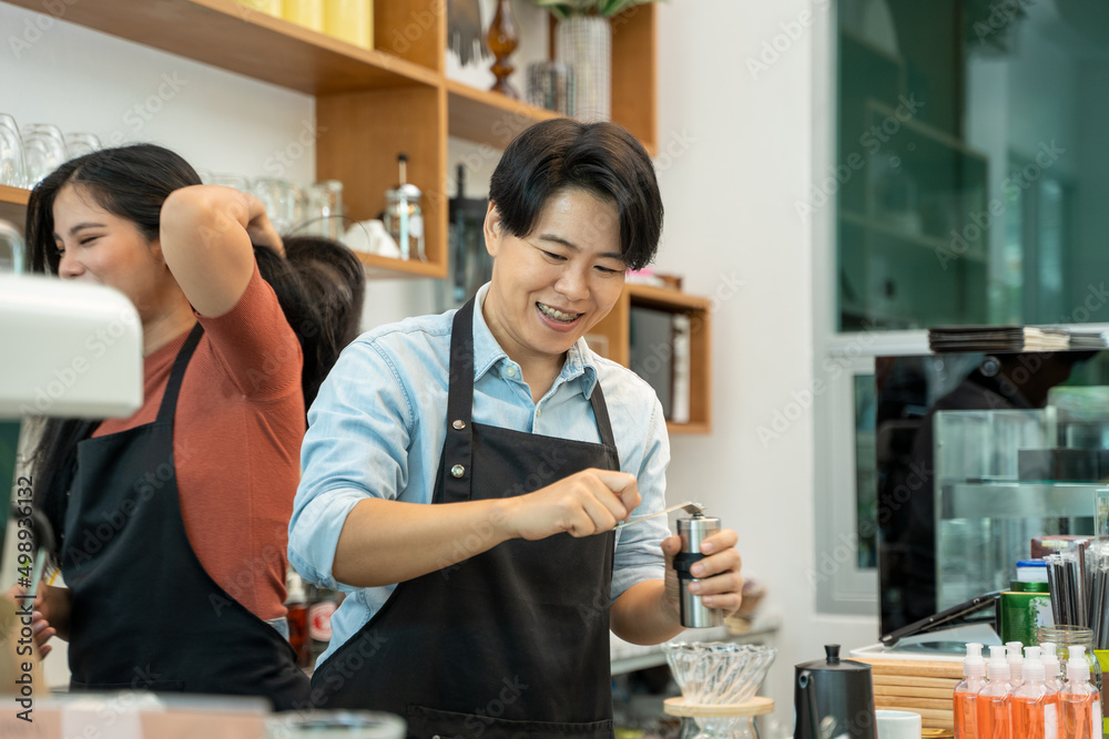 Female Owner Of Coffee Shop,Female barista cafe owner standing inside the coffee counter,Coffee maki