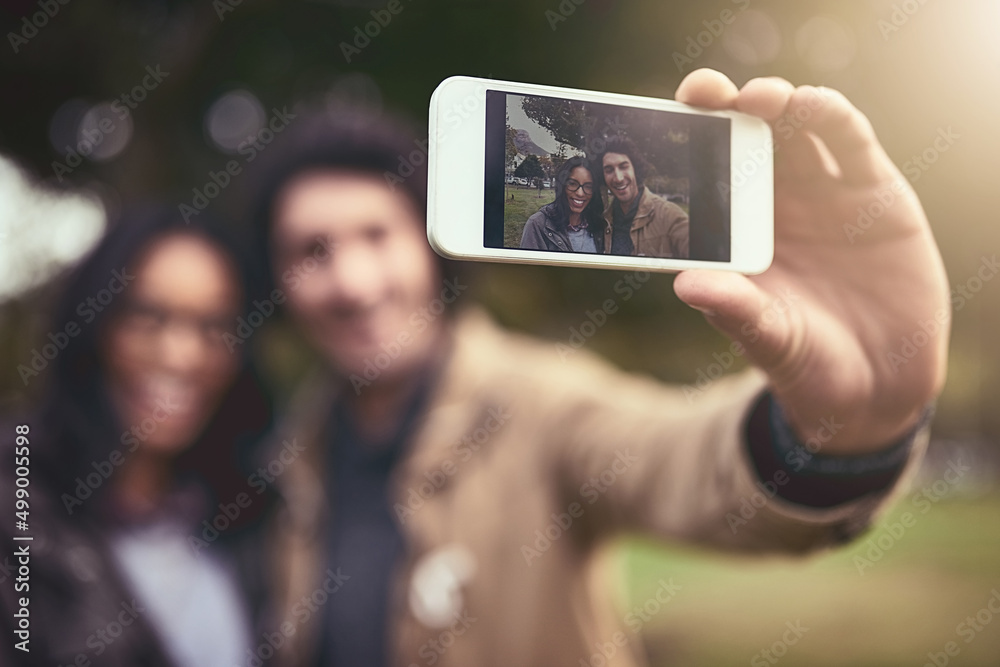 This one os for the memories. Shot of a cheerful young couple taking a self portrait together while 