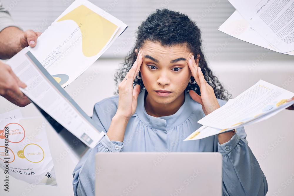 This is all too much. Cropped shot of an attractive young businesswoman looking stressed while being