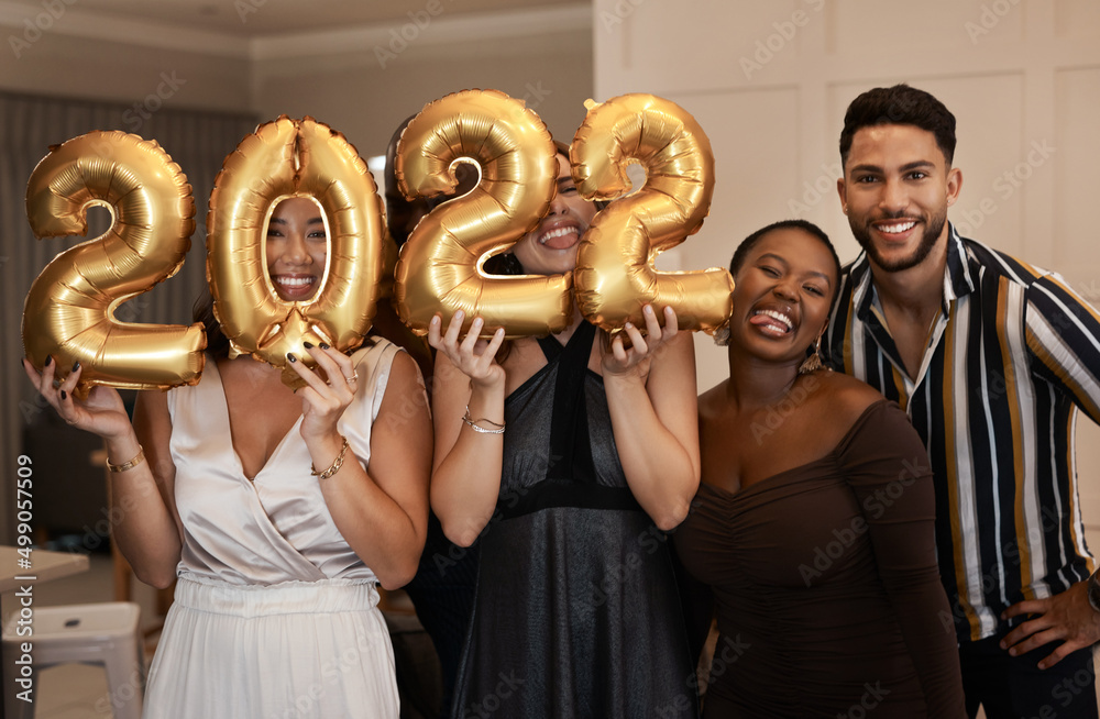 Were stoked for the New Year. Shot of a diverse group of friends standing together and holding up 20