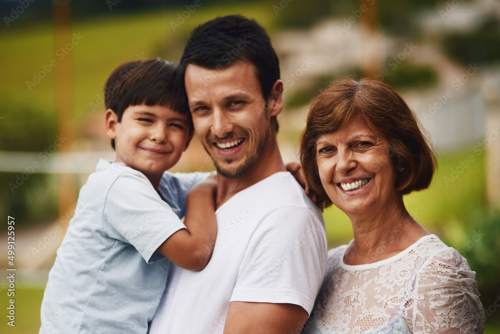 Quality time keeps our bond strong. Portrait of a young man spending time with his mother and son at