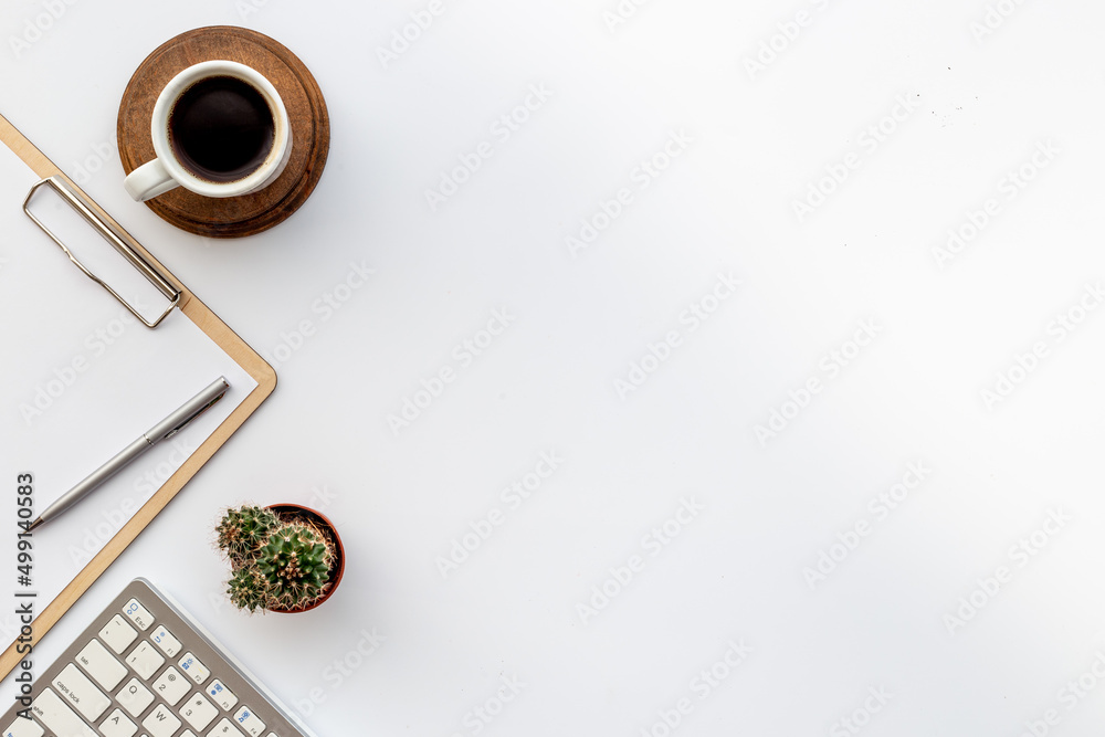 White office working place with computer and cup of coffee