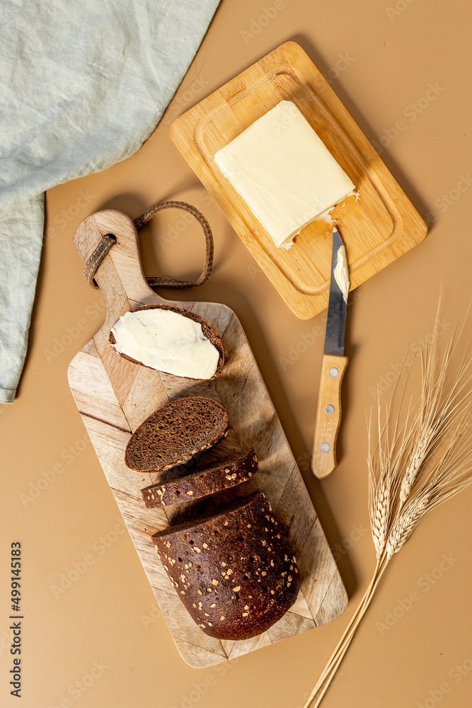 Home baked bread with butter. Healthy breakfast, top view