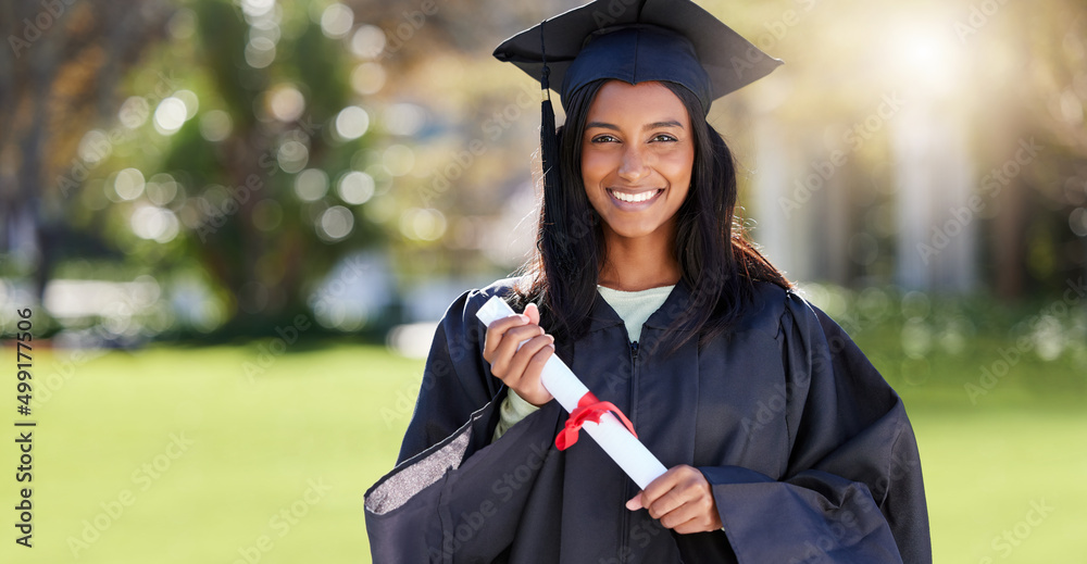 Its been a long journey. Cropped portrait of an attractive young female student celebrating on gradu