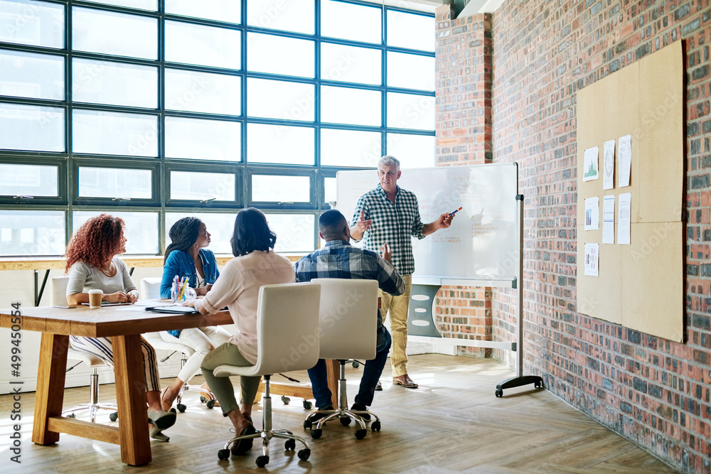 Develop a clear vision for your business. Shot of a businessman giving a presentation in the boardro