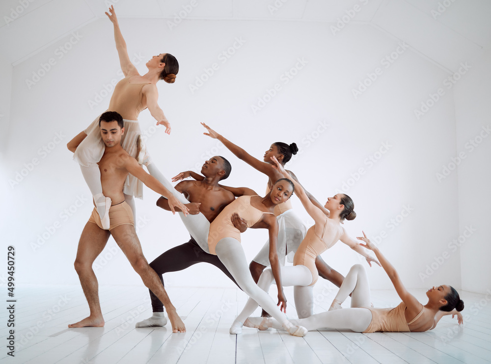 Through dance, we can present a solid story. Shot of a group of ballet dancers practicing a routine 