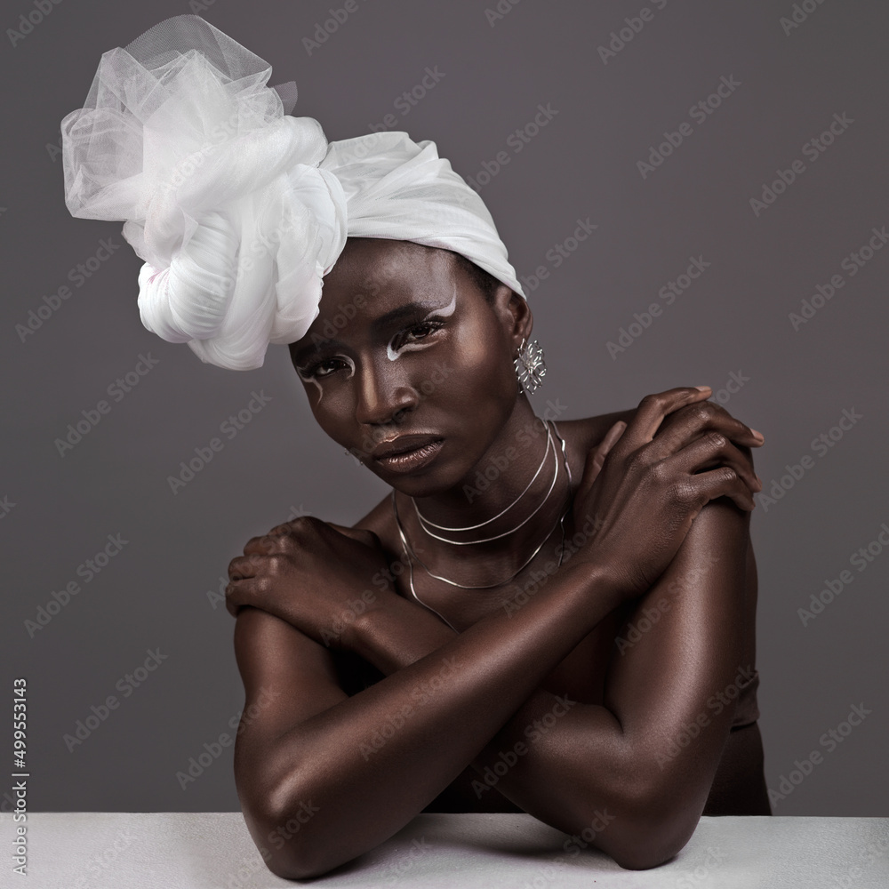 The undeniable beauty of a head wrap. Studio portrait of an attractive young woman posing in traditi