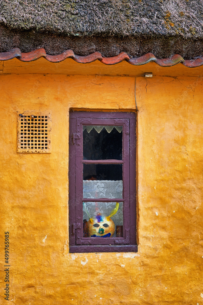 Cottage life. A window seen from the outside of a charming cottage.