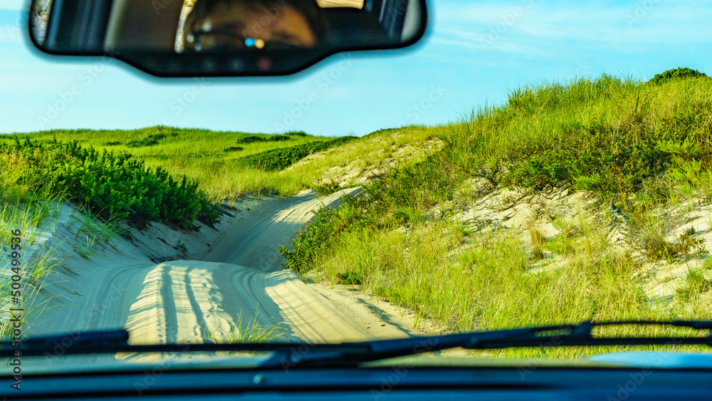 Sand Dunes and Grass of the Provincelands view from the car Cape Cod MA.