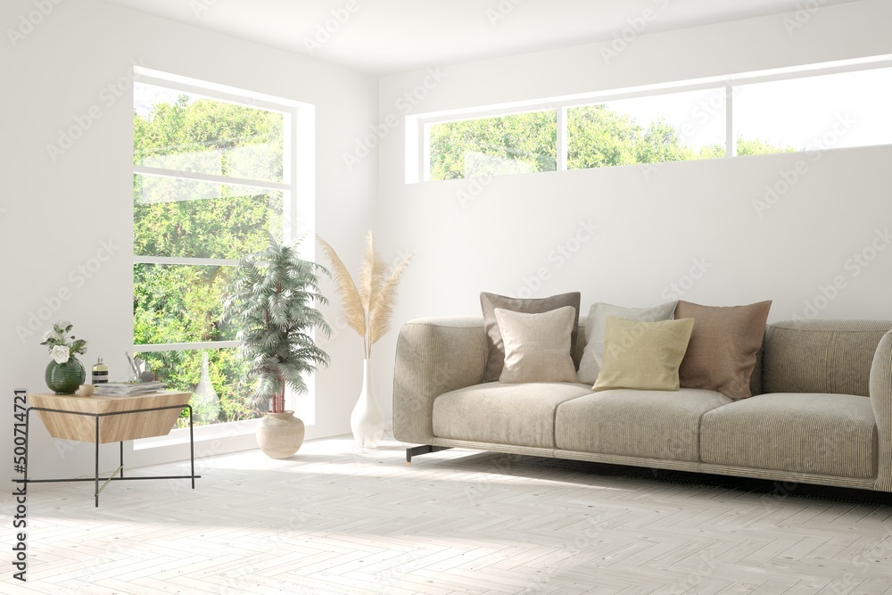 Minimalist living room in white color with sofa and summer landscape in window. Scandinavian interio