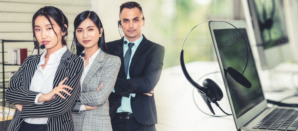 Business people wearing headset working in office to support remote customer or colleague. Call cent