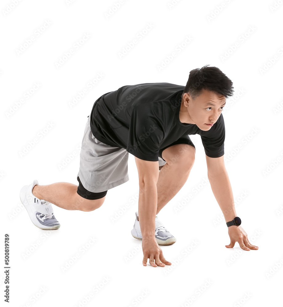 Sporty male runner on white background