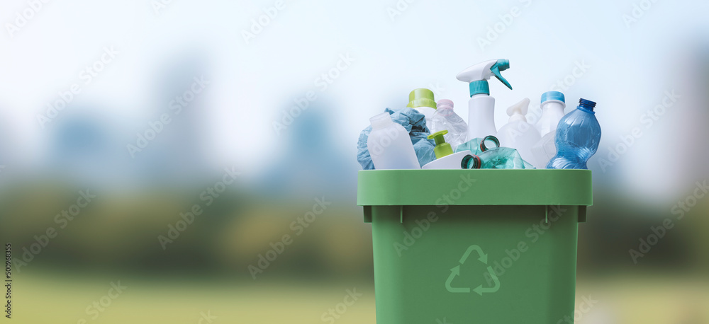 Waste bin full of plastic waste