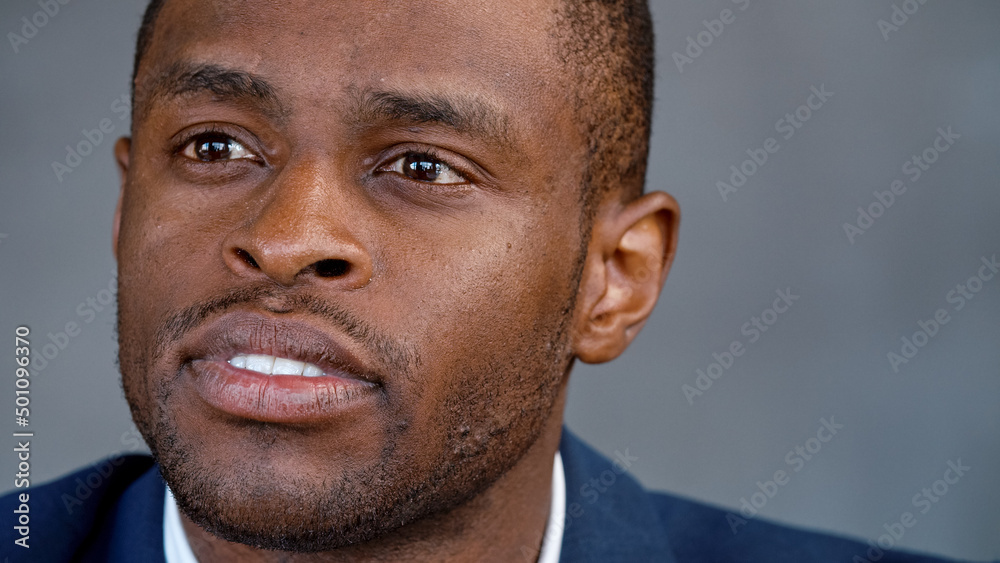 Portrait of african american man in a suit at a business meeting