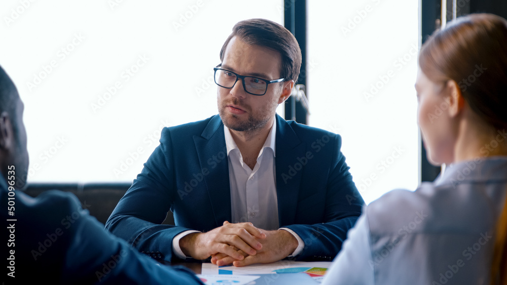 A group of people at a business meeting