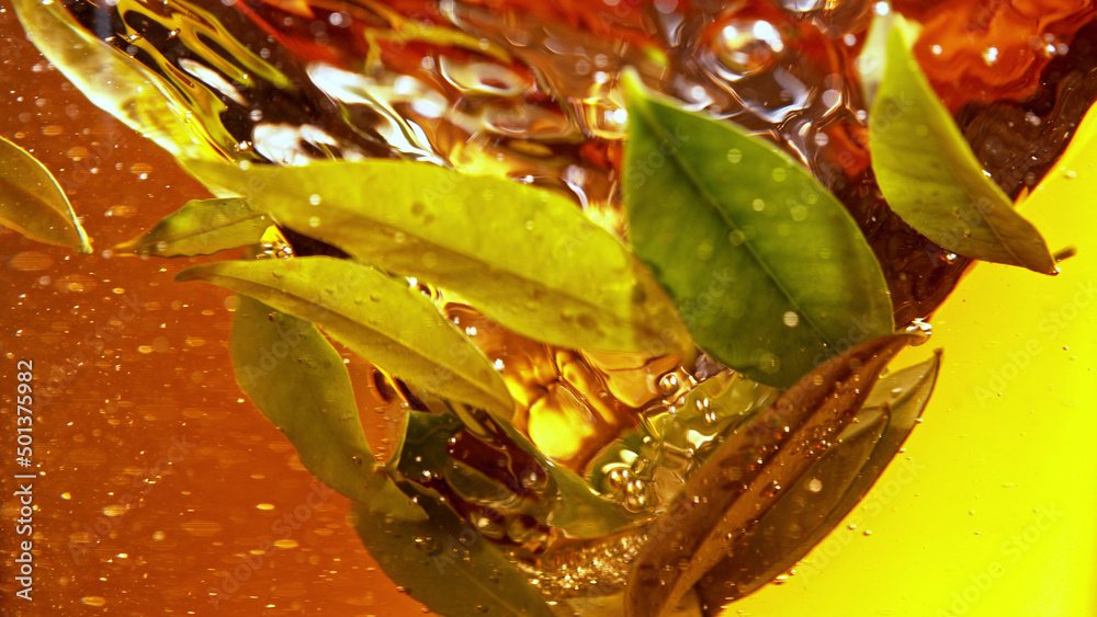 Detail of rotating tea leaves in water twister.