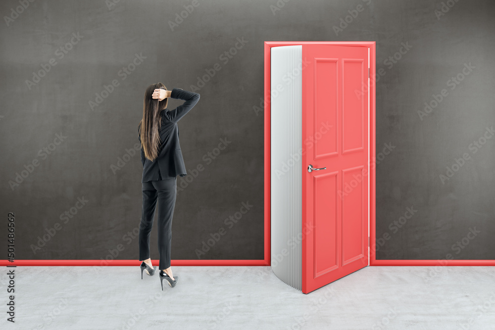 Thoughtful european businesswoman looking at creative open red book door in concrete interior. Educa