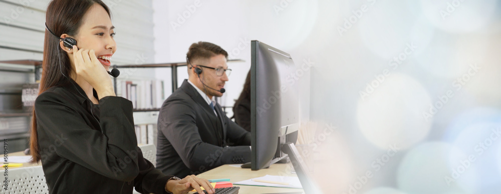 Business people wearing headset working in office to support remote customer or colleague. Call cent