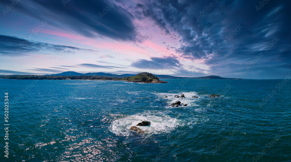 Panorama ashore on a peninsula in the Black Sea in Bulgaria under a stormy sky