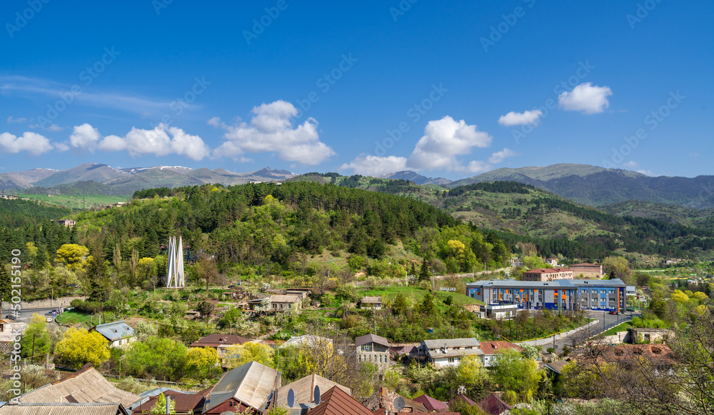 Beautiful view of Dilijan city in Armenia with mountains and blue sky in background