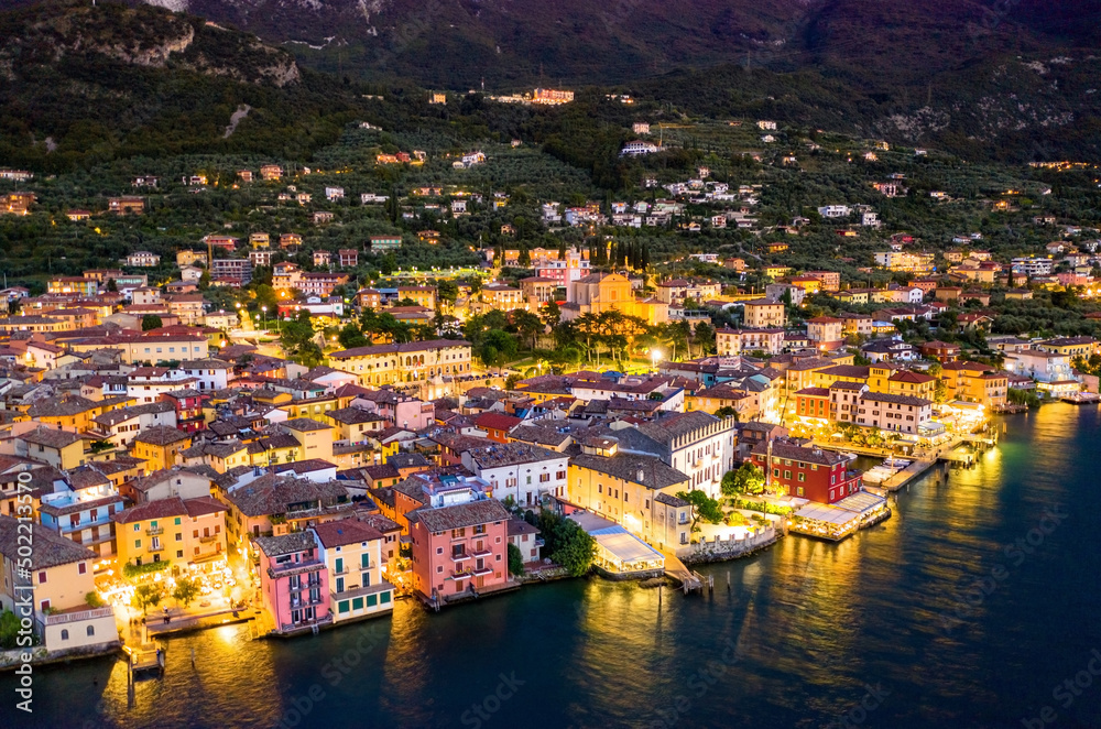 Aerial night view Malcesine on Lake Garda in Northern Italy