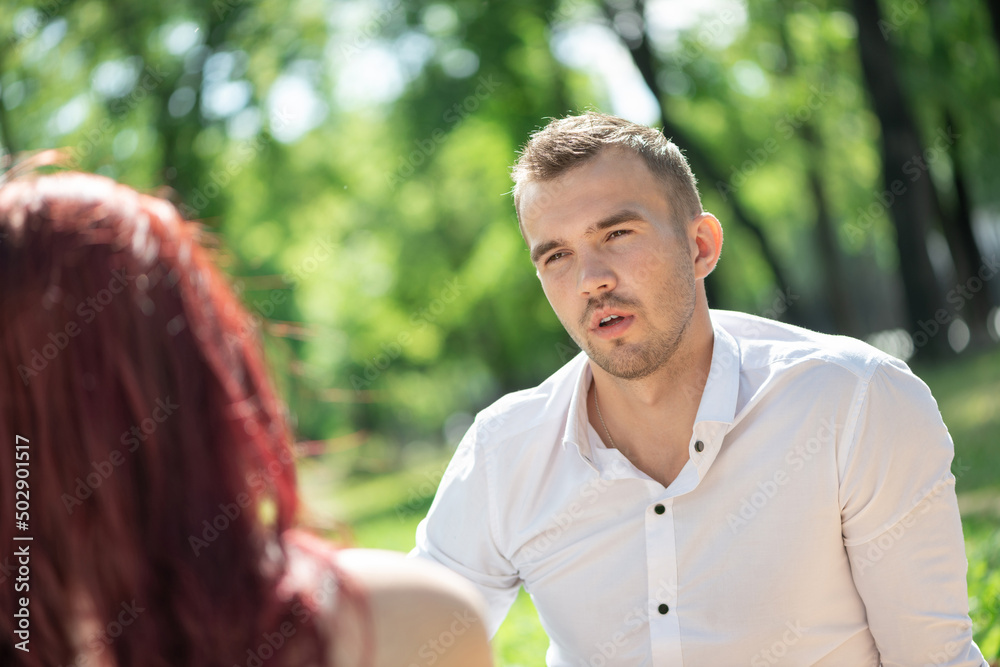 Couple with a dog in the park