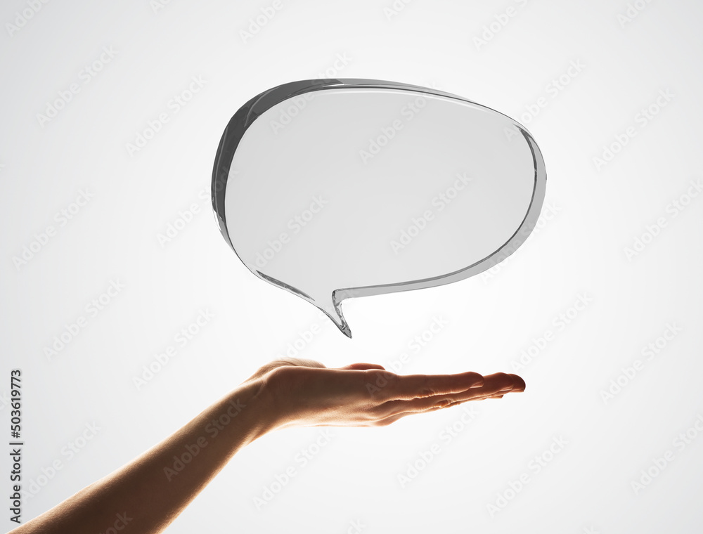 Concept of communication by glass empty chat icon on gray background