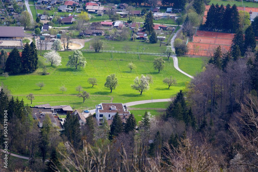 Panoramic view from local mountain Uetliberg over City of Zürich on a blue cloudy spring day. Photo 