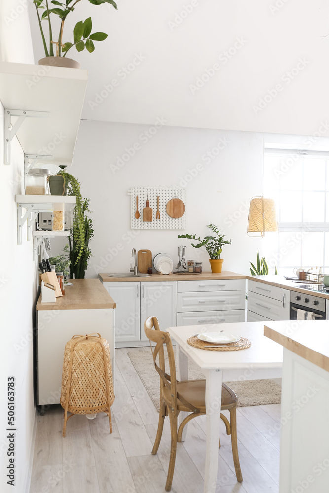 Interior of stylish kitchen with modern furniture