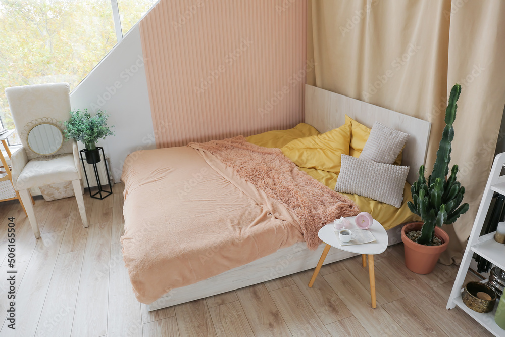 Interior of stylish bedroom with coffee table