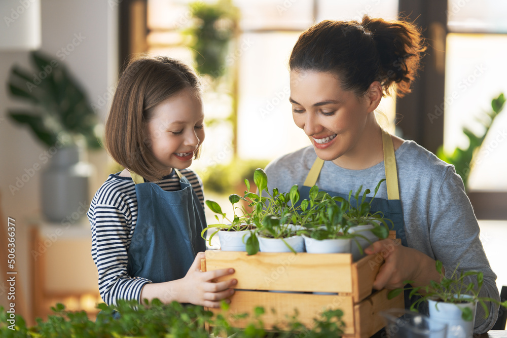 Family caring for plants