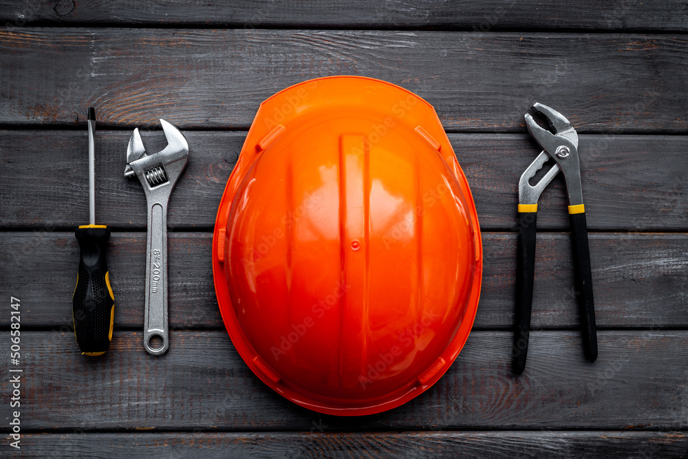 Engineer safety helmet with construction tools, top view