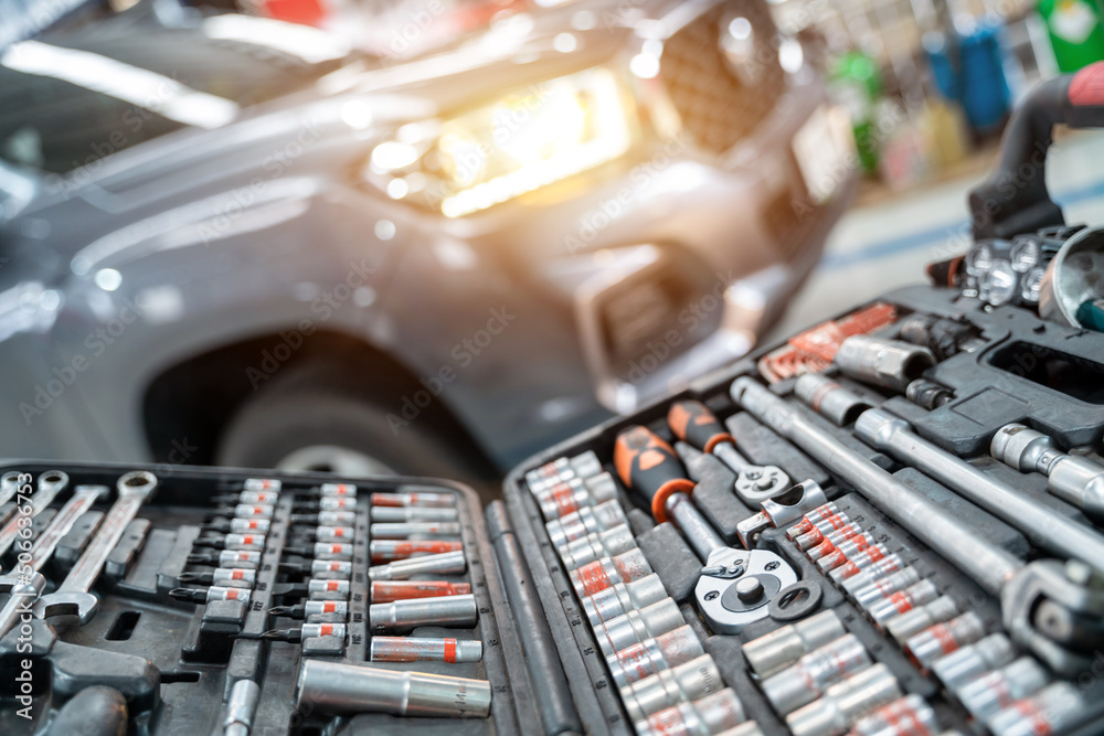 Select focus equipment or wrenches for car repairs in Car repair station.