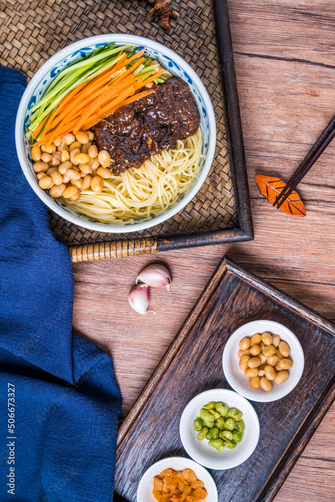 Beijing food old Beijing fried sauce noodles placed on wooden table